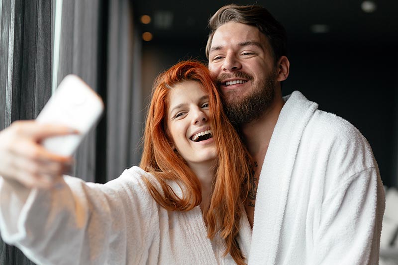 couple having a spa day, day spa, bathrobes, man and woman couple